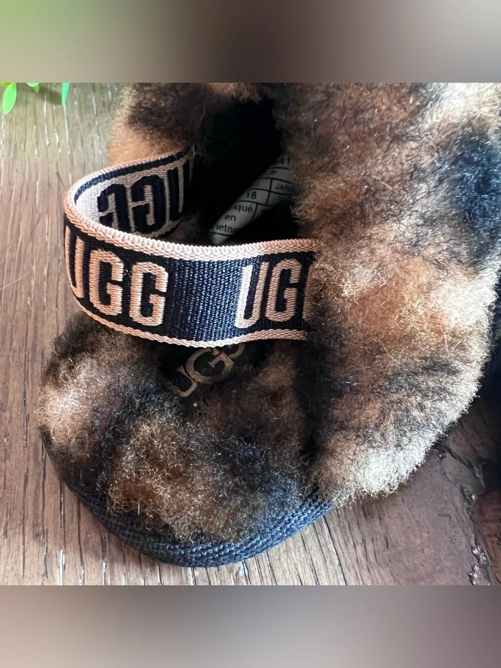 UGG Leopard Print Fuzzy Baby Slippers in Brown and Black
